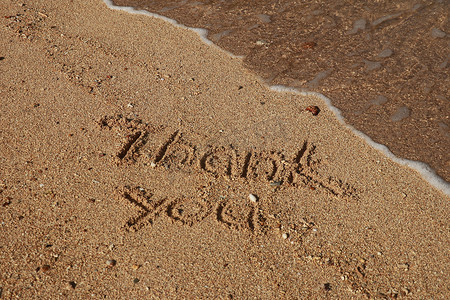 谢谢，感恩概念，漂亮的卡片，沙滩上写的字