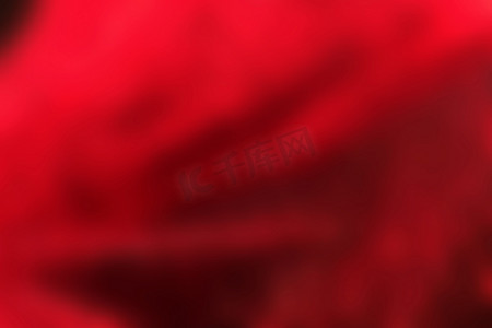 红色褶皱，抽象模糊的背景，柔软的面料