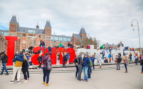 拉票口号摄影照片_我阿姆斯特丹的口号与游客群