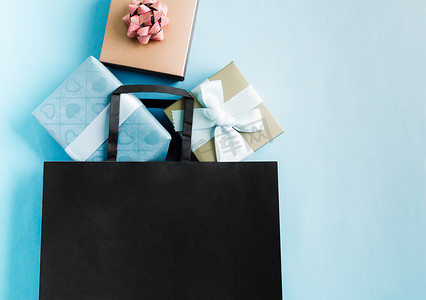 节礼日销售，带礼盒的黑色购物袋，用于网上购物