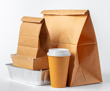 包装盒展开图摄影照片_一套白色背景的可回收食品包装