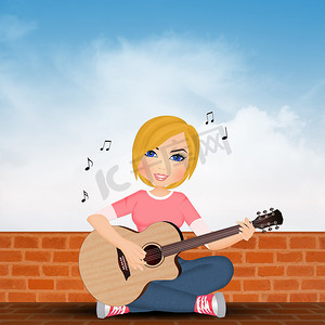 坐弹吉他摄影照片_坐在墙上弹吉他的女孩