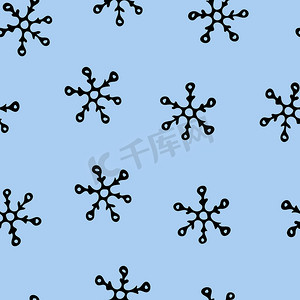 无缝模式与浅蓝色背景上的雪花。
