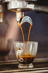 普洱咖啡摄影照片_咖啡机的特写