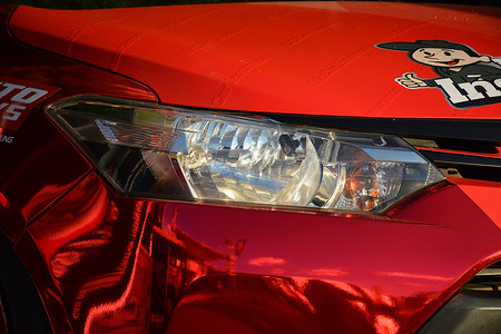丰田汽车摄影照片_披赛帕赛 Bumper to Bumper 车展上的丰田 vios 车头灯