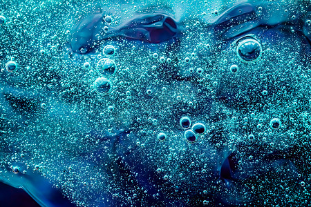 宇宙摄影照片_抽象海蓝宝石液体背景、油漆飞溅、漩涡图案和水滴、美容凝胶和化妆品质地、当代魔法艺术和科学作为豪华平面设计