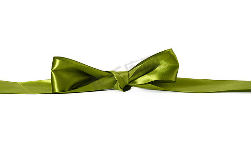 白色背景上由绿色丝带制成的打结蝴蝶结，用于包装礼物的装饰