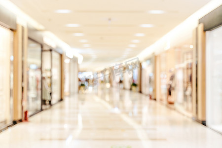 豪华百货商场购物中心内部，抽象的散焦模糊与散景背景，购物季节设计的概念。