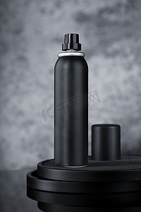 黑色，黑色摄影照片_用于模型的黑色除臭剂发胶铝罐