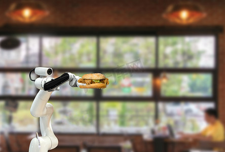 智能机器人食品在餐厅未来机器人自动化中拿着汉堡包提高效率
