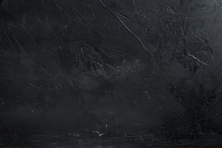 黑色混凝土墙纹理黑色多灰尘的背景方舟背景纹理。