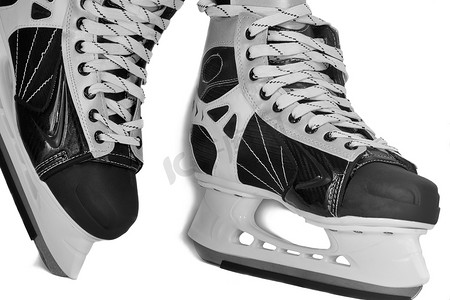 蓝色溜冰鞋摄影照片_白色背景的男式溜冰鞋，特写。