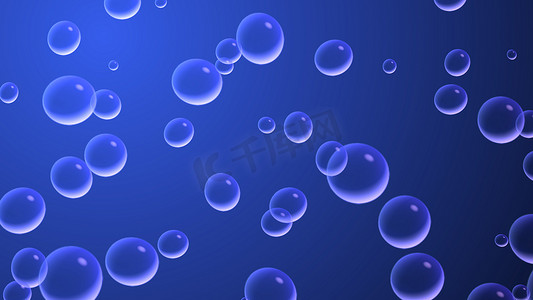 深蓝色蓝色摄影照片_深蓝色海水中的水下气泡