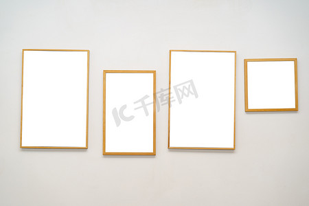 木相框摄影照片_白墙上的空白模拟木相框。