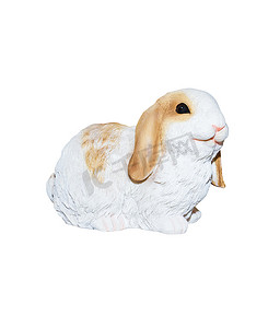 泥娃娃摄影照片_孤立在白色背景上的兔子灰泥