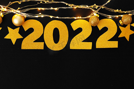2022 年的概念。纸背景上的金星和数字 2022