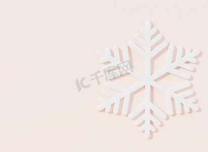 下雪花摄影照片_粉红色柔和背景下的雪花圣诞节