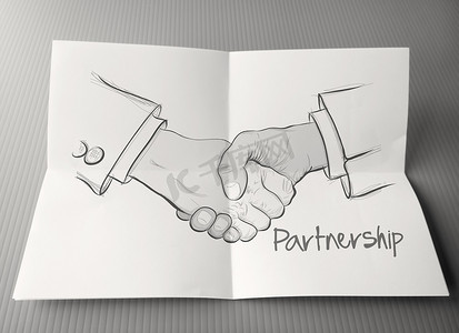手绘握手摄影照片_手绘握手标志作为伙伴关系经营理念