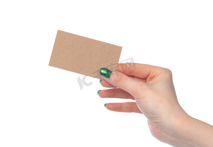 女性手中的工艺纸卡被白色隔离