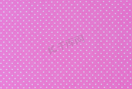 圆点效果图案摄影照片_带白色圆点的粉红色织物背景纹理