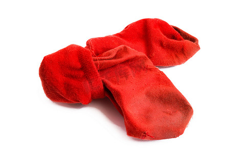 脏袜子摄影照片_孤立在白色背景上的脏红袜子