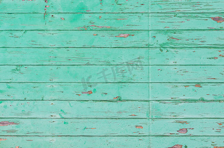 绿色过时摄影照片_有油漆剥落的旧绿色木板