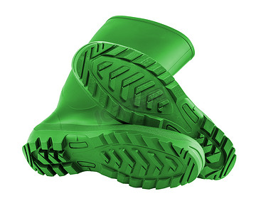 踏面摄影照片_白色背景中隔离的一双绿色干净的新橡胶靴