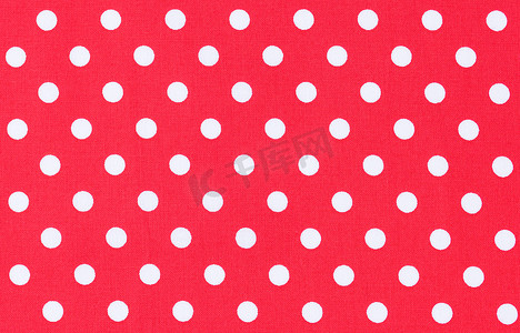 白色点缀摄影照片_白色点缀红色纺织品的布料背景纹理