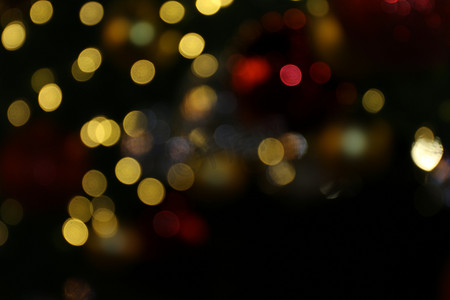 散景背景色彩缤纷，圣诞快乐，新年快乐散景照明在夜间背景上闪耀，散景闪光，闪闪发光的壁纸