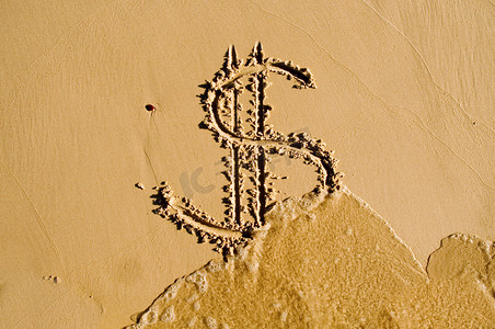 在沙子里画的美元符号