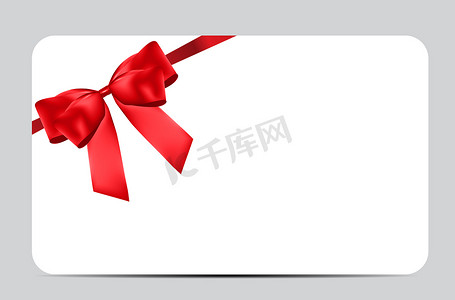 礼品卡模板摄影照片_带红色蝴蝶结和丝带的空白礼品卡模板。