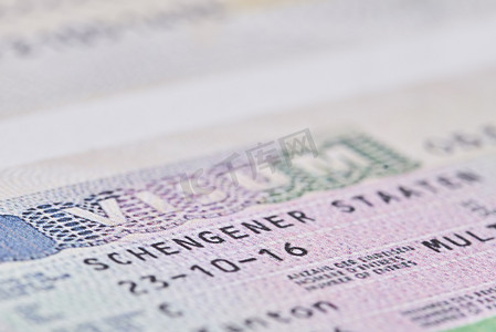 护照签证摄影照片_护照上的申根签证。