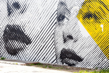 小巷背景摄影照片_迈阿密，美国-2014 年 8 月 29 日： 墙上的涂鸦艺术在涂鸦设计区 Wynwood 2014 年 8 月 29 日在佛罗里达州迈阿密。