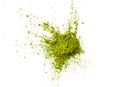 绿粉粉摄影照片_绿抹茶粉爆炸，白色背景