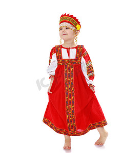俄罗斯双小镇摄影照片_身着俄罗斯民族服装的女孩。