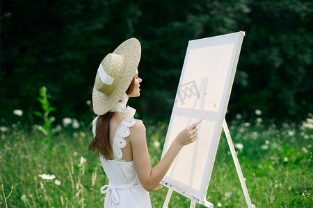 风景图画摄影照片_大自然中穿白裙的女人描绘了一幅风景爱好的图画
