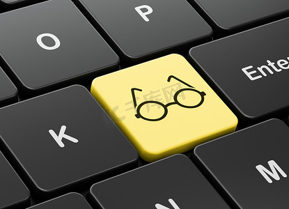 科学概念：计算机键盘背景上的眼镜