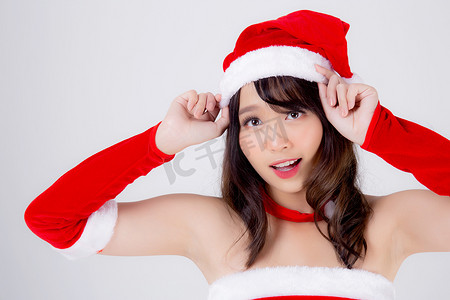 苏普摄影照片_美丽的亚洲年轻女子肖像圣诞老人服装戴帽子苏普