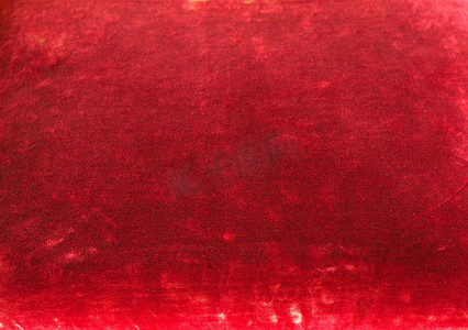 织物纹理摄影照片_红色天鹅绒织物纹理背景
