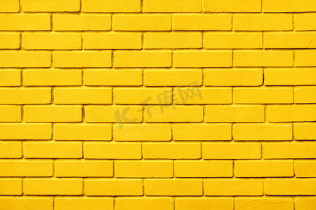 彩绘砖设计黄色墙壁背景块。