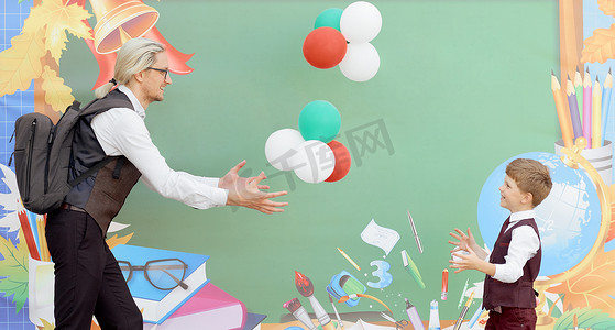 职业学校摄影照片_第一个学习日，父亲在学校背景下和儿子玩气球