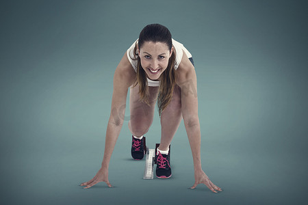 准备跑步位置的女运动员的合成图像