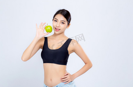 青团榴莲摄影照片_肖像亚洲女人微笑着拿着和吃青苹果果