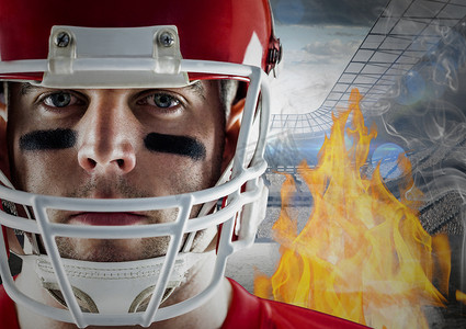 论坛矢量摄影照片_有火焰和体育场的美国足球运动员在背景中