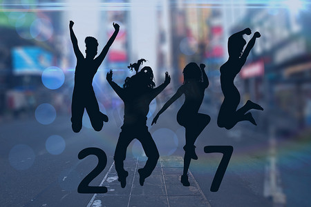 跳跃的人形成 2017 年新年标志的剪影