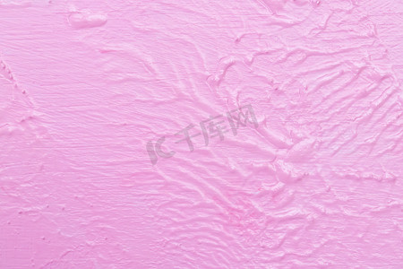 崎岖的粉色墙壁的质地和水彩不均匀