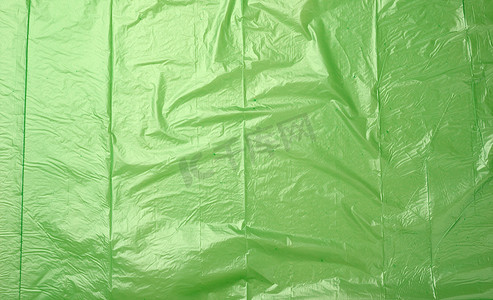 框摄影照片_皱巴巴的绿色聚乙烯纹理，特写，全框