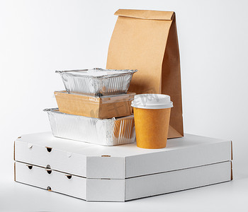 茶叶包装包装盒摄影照片_白色背景下的一套可回收食品包装