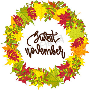五颜六色的秋叶圆框和手写刻字甜蜜的十一月。