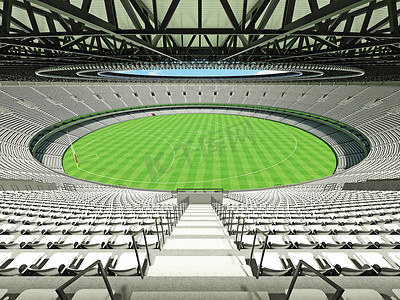 美丽的现代圆形澳大利亚规则足球场，配有白色座椅和 VIP 包厢
